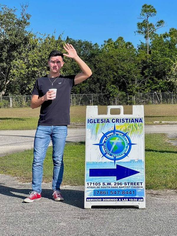 friendly greeter wait for you as you park at Global Church